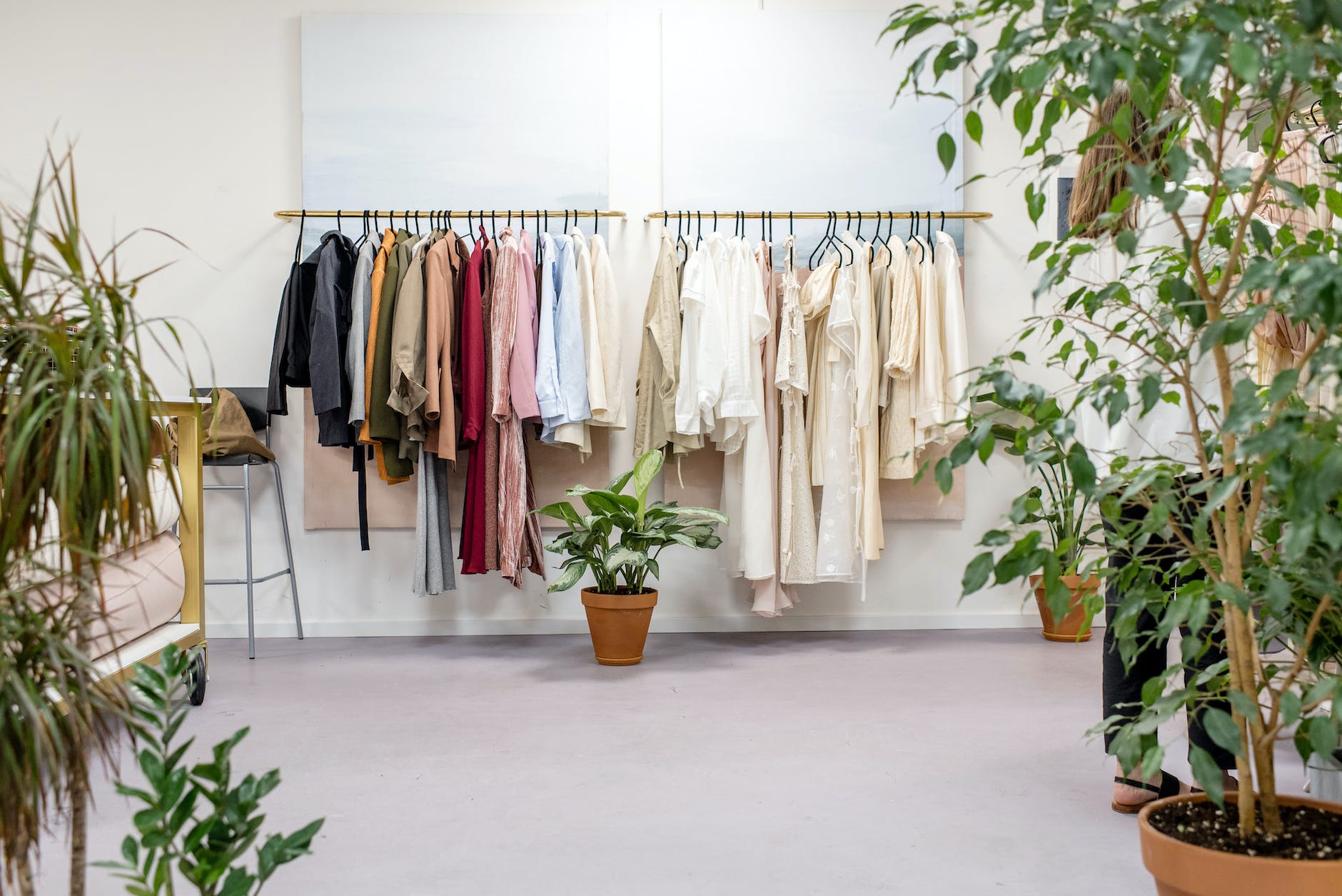 A neatly organized closet with a selection of high-quality, versatile clothing, symbolizing the essence of a minimalist wardrobe.