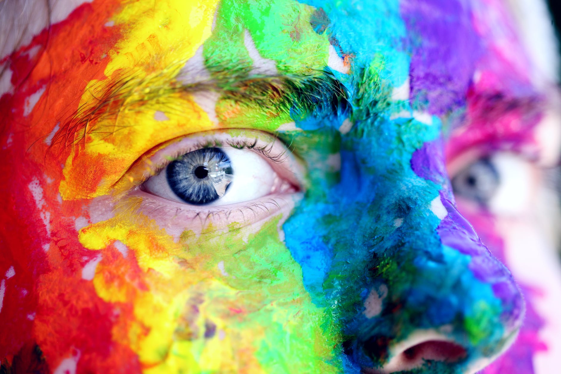 Colorful face, symbolizing the diverse emotional impacts of different hues on human psychology.